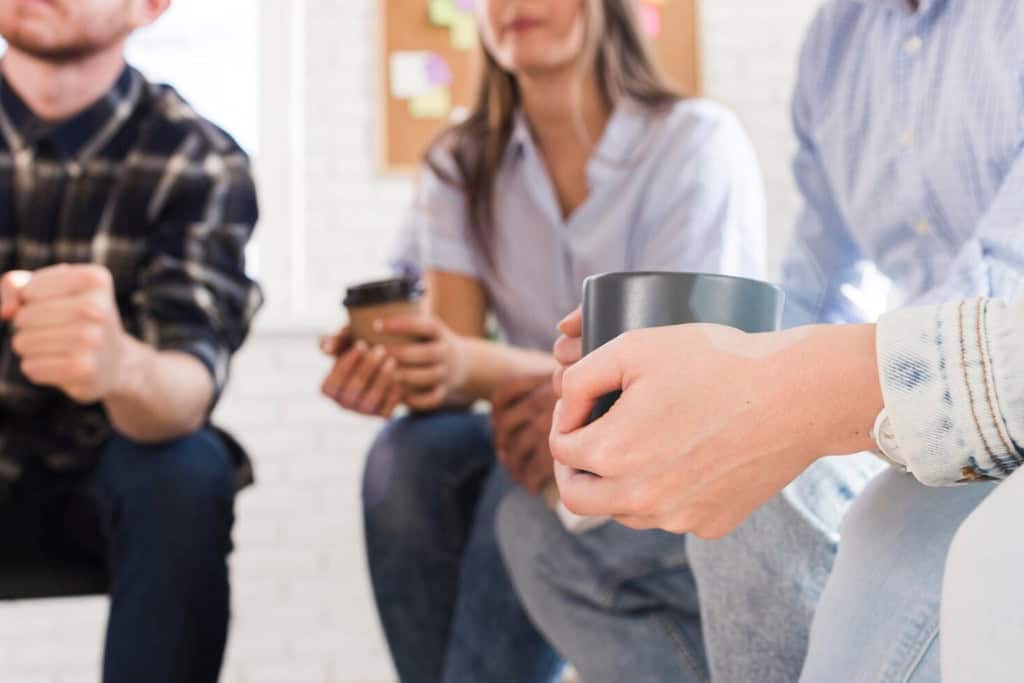 Participants in a group therapy session at an alcohol rehab in Reseda CA, supporting each other through recovery.