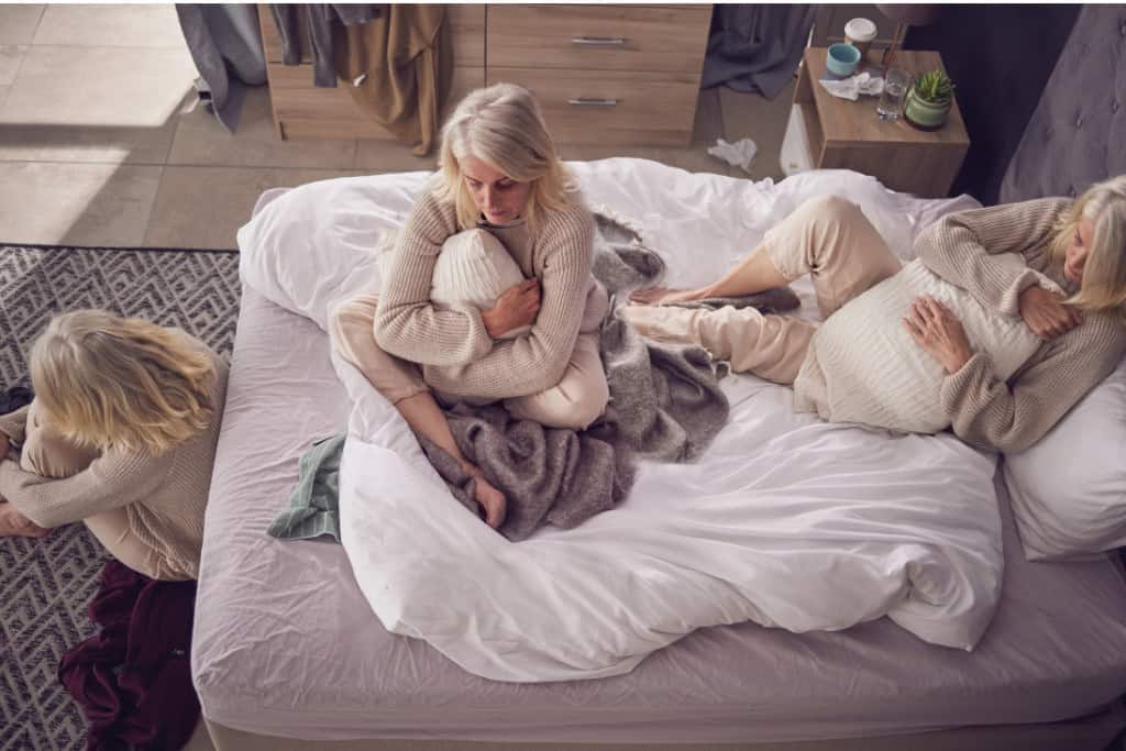 A senior woman expresses emotional distress alone in a room, capturing the isolation often associated with bipolar episodes. This highlights the need for compassionate bipolar treatment options in Reseda, CA.