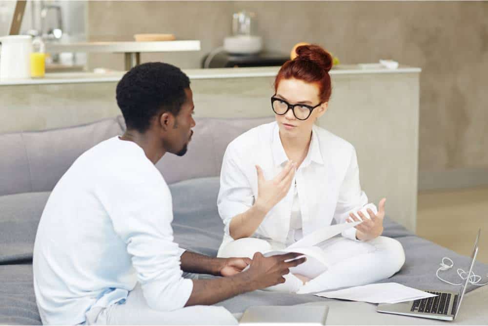One-on-one counseling session between therapist and client at an inpatient rehab in Reseda, CA, focusing on mental health and addiction recovery.